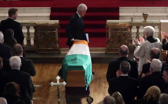 Former US President Bill Clinton pictured at the funeral of Martin McGuinness
