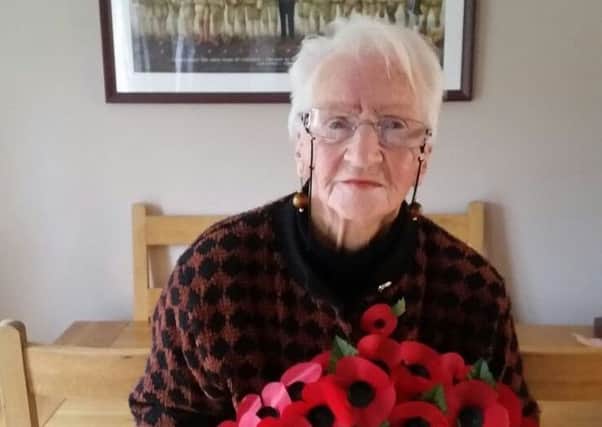 Nellie O'Donnell getting ready for this year's Remembrance service