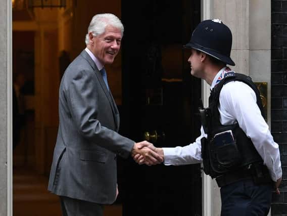 Former US President Bill Clinton arrives in Downing Street, London, ahead of talks with Prime Minister Theresa May to discuss the current political situation in Northern Ireland.