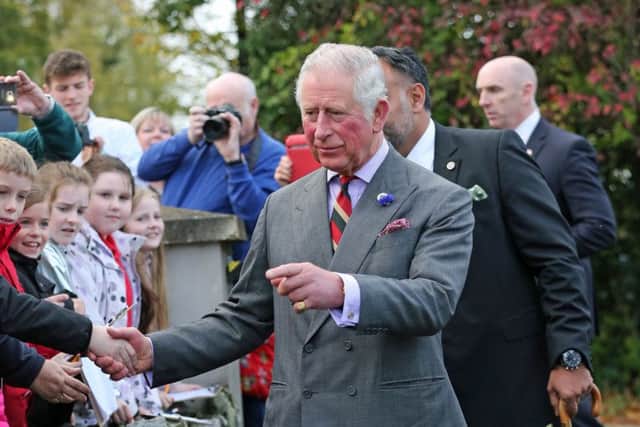 The Prince of Wales meets well-wishers outside the Eglinton Community Centre in Londonderry during a visit to communities hit by the summer's flash floods. PRESS ASSOCIATION Photo. Picture date: Friday October 20, 2017. See PA story ULSTER Charles. Photo credit should read: Laura Hutton/PA Wire