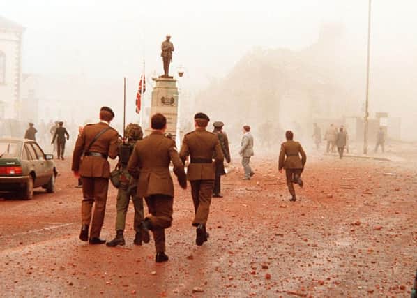 The 1987 IRA 
Enniskillen Poppy Day massacre at a Remembrance Day service which killed 11 people.  A nurse who volenteered to help in the aftermath asked Lord Eames: 'Where is God in all this?'