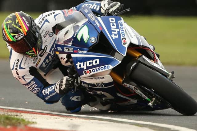 Michael Laverty claimed the runner-up spot in the first Superbike race at this year's Sunflower Trophy meeting on his return to the Tyco BMW team.