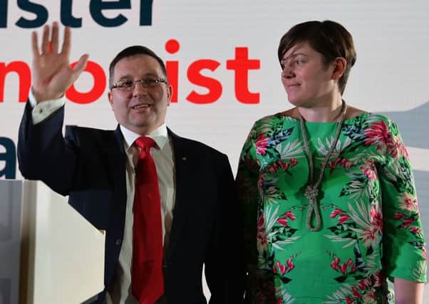 Leader Robin Swann with his wife after his speech to the Ulster Unionist Party conference in Armagh
