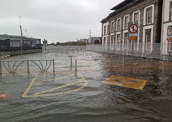 Flooding at Merchant's Quay Plaza in Limerick as Storm Brian hit Ireland with winds of up to 80mph battering coastal areas
