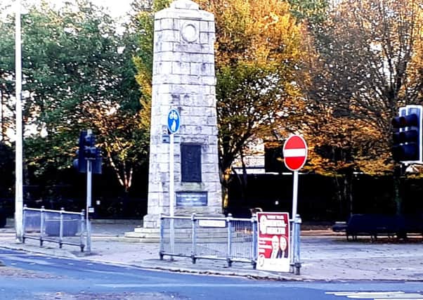 SF poster concerning mental health affixed to a railing next to the Omagh's cenotaph. Chris Smyth, UUP councillor, Omagh, took this image on October 27