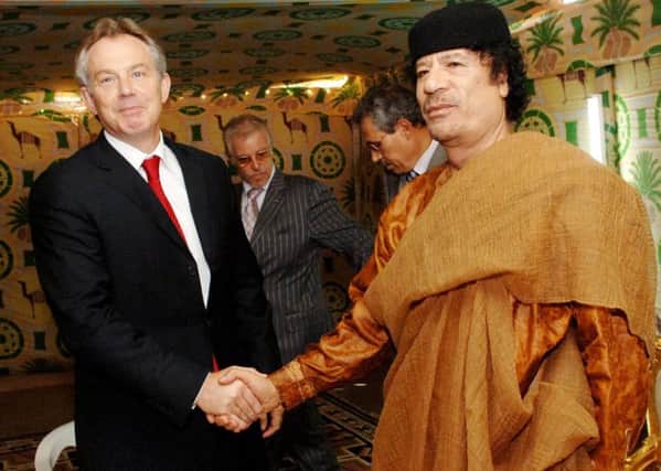 Former Prime Minister Tony Blair meeting Libyan leader Colonel Muammar Gaddafi at his desert base outside Sirte south of Tripoli in 2007. Strategic interests are a higher priority to the government than victims claims, says Kenny Donaldson. Photo: Stefan Rousseau/PA Wire