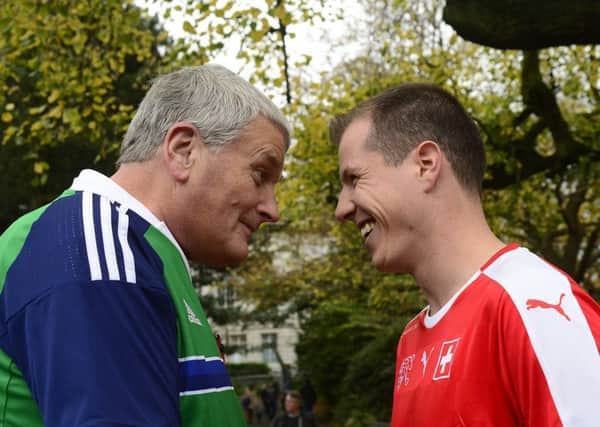 PACEMAKER BELFAST  31/10/2017:
 Jim Wells (in his Northern Ireland shirt) and his son in law Tom Bach (in his Switzerland shirt),pictured at Botanic Gardens in Belfast.
Picture By; Arthur Allison/Pacemaker Press