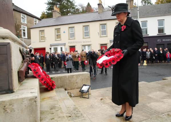 DUP leader and then first minister Arlene Foster lays a wreath during the 2016 Enniskillen Remembrance service.
 
Photo by Kelvin Boyes / Press Eye
