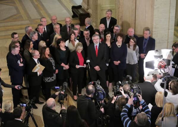 Sinn Fein leaders Gerry Adams and Michelle ONeill with newly elected Sinn Fein MLAs at Stormont earlier this year. 
Photo by Kelvin Boyes / Press Eye