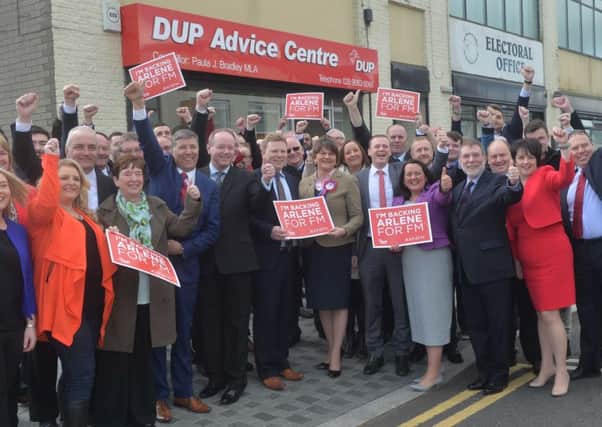 DUP members pictured outside one of the partys South Antrim constituency offices