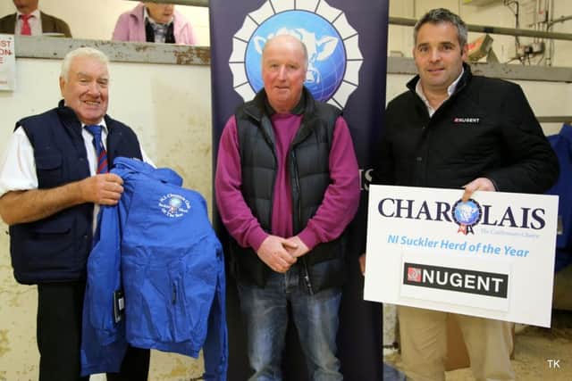 Tyrone County Winner & Overall  Suckler Herd of the Year winner presented by Mr Harry Marquess to Mr Noel McIlwaine and Co Tyrone Sponsor Nugent Engineering represented by Mr Damian Nugent