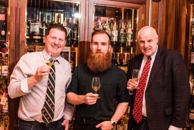 Paul O'Hare, Joe Magowan and Willie Jack at the launch of The Friend at Hand Powers Single Cask Release. Picture by Elaine Hill.