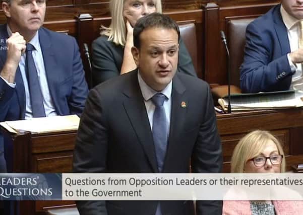 Screengrab image of Taoiseach Leo Varadkar wearing an Irish-themed Shamrock Poppy badge to commemorate the island's war dead, whilst speaking at the Dail. Photo: PA Wire
