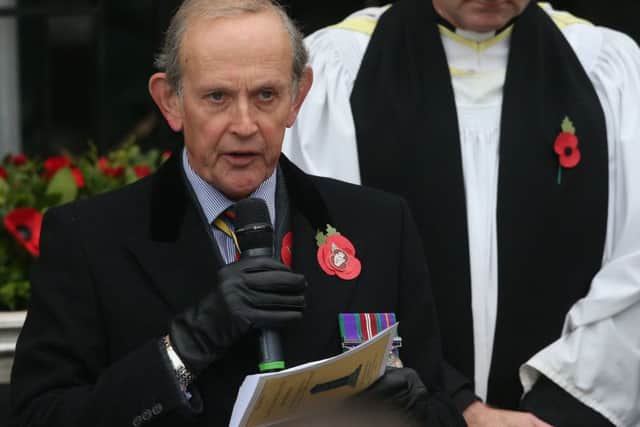 Viscount Brookeborough reads a message from the Queen during the ceremony to unveil the new memorial