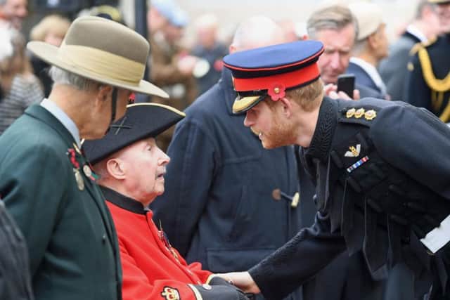 Prince Harry meets veterans at Westminster Abbey's Field of Remembrance