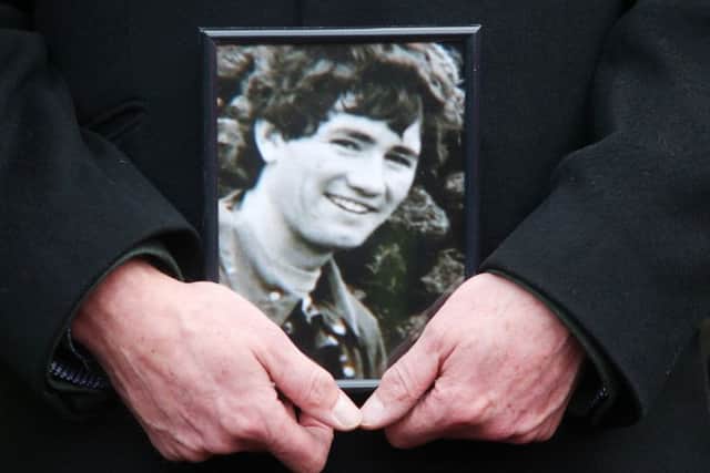 A picture of Robert Nairac is held at the 
11th annual Silent Walk for the Disappeared at Stormont. Picture by Jonathan Porter/Presseye.com