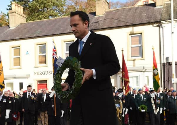 Taoiseach Leo Varadkar lays a wreath at the war memorial during events to remember the 12 victims of the IRA's 1987 Remembrance Sunday bomb attack in Enniskillen, Co Fermanagh. PRESS ASSOCIATION Photo. Picture date: Sunday November 12, 2017. See PA story ULSTER Enniskillen. Photo credit should read: Phil Fitzpatrick/PA Wire