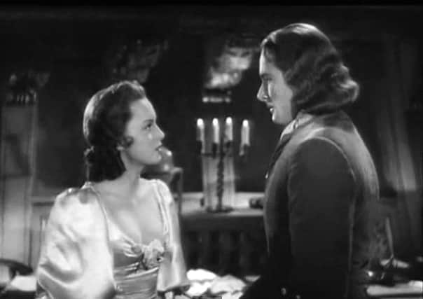 Olivia de Havilland and Errol Flynn in the film trailer for Captain Blood, 1935