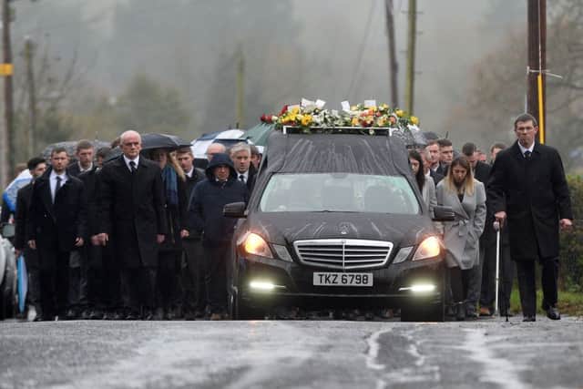 Mourners walking behind the hearse at the funeral of Glenavy man Matthew Bradley. Pic by Pacemaker Press