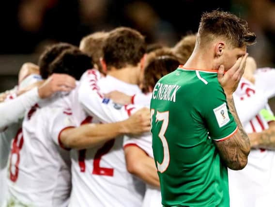 Jeff Hendrick is devastated as Denmark players celebrate their success