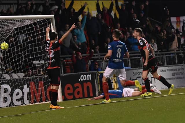 Crusaders' Gavin Whyte celebrates after making it 2-0 against Linfield. Pic by Pacemaker