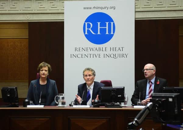 RHI inquiry chairman Sir Patrick Coghlin, centre, with panel member Dame Una O'Brien and Dr Keith MacClean, the inquiry's technical assessor