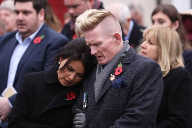 Stephen Gault who lost his father Samuel Gault in the Enniskillen Poppy Day Bomb with his wife Sharon during the service at the unveiling and dedication of the controversial memorial.
