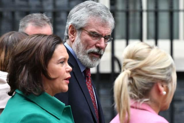Sinn Fein President Gerry Adams (centre) with Deputy leader Mary Lou McDonald (right) and Northern Ireland leader Michelle O'Neill leaving Downing Street, London, after talks with the Prime Minister on the ongoing powersharing crisis at Stormont