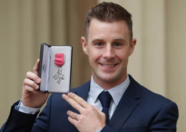 World Superbike champion Jonathan Rea, after being presented with an MBE by the Duke of Cambridge, at Buckingham Palace, London.