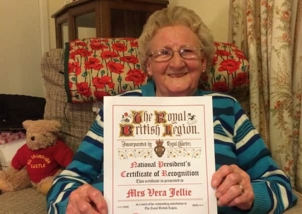 Vera Jellie (92) with her National Presidents Certificate of Reconigiton.